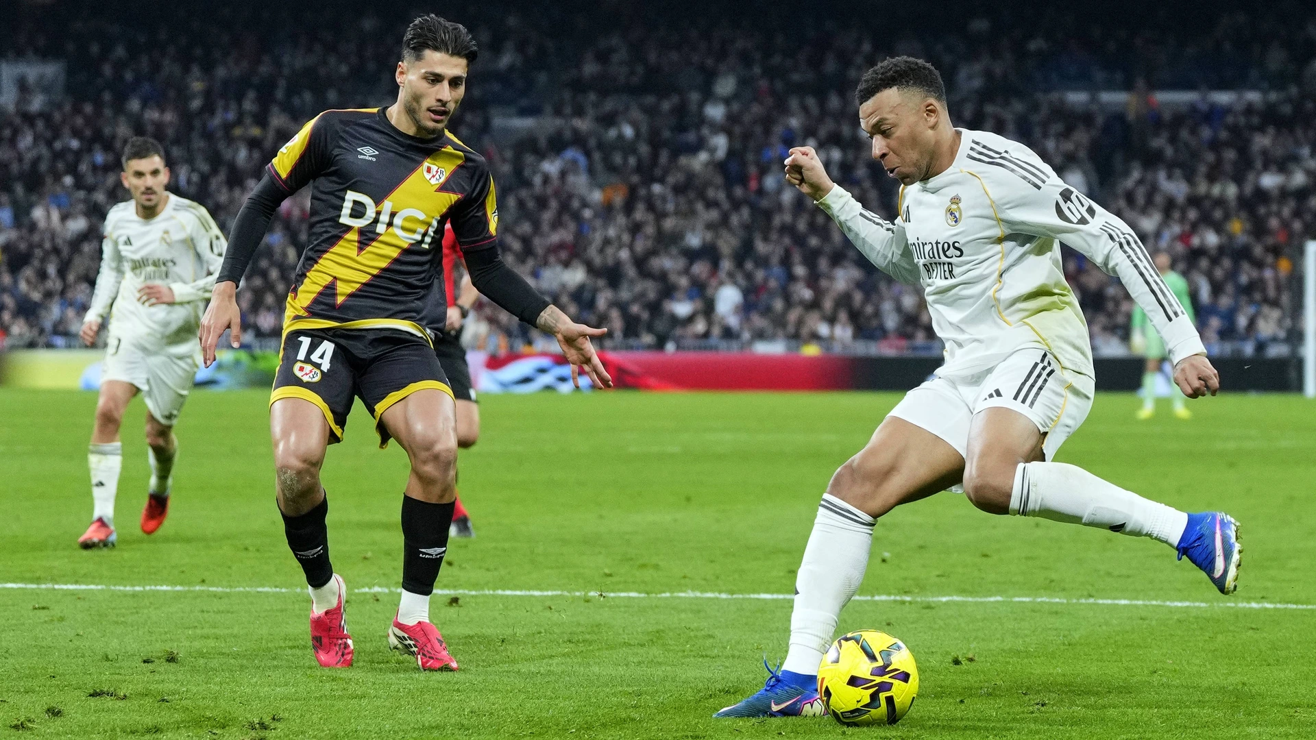 Kylian Mbappe of Real Madrid CF and Carlos Martin of Rayo Vallecano SAD during the La Liga EA Sports match between Real Madrid CF and Rayo Vallecano played at Santiago Bernabeu Stadium on February 1, 2026