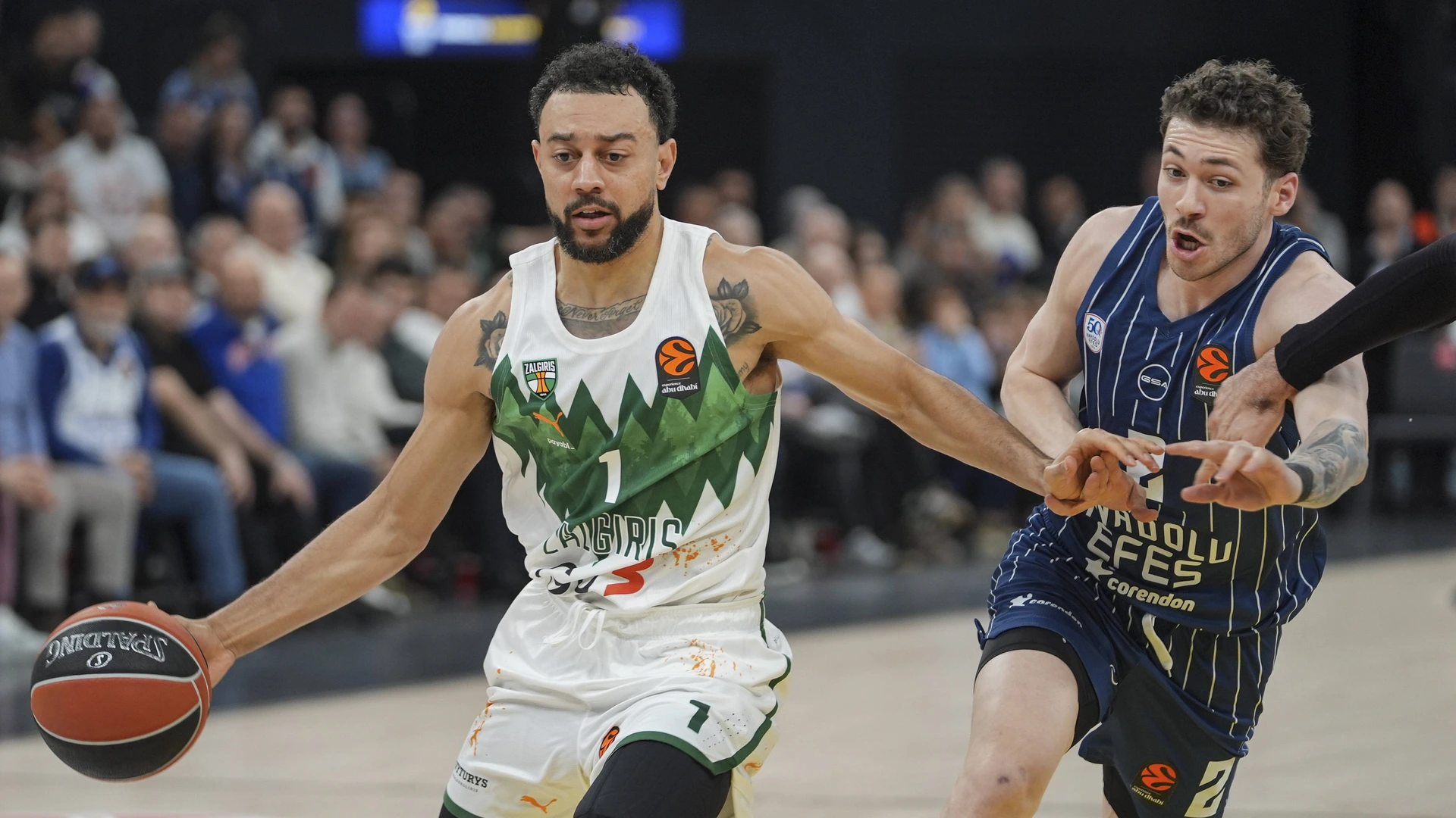 Sehmus Hazer 2 of Anadolu Efes in action against Nigel Williams-Goss 1 of Zalgiris during the EuroLeague week 27 basketball match between Anadolu Efes and Zalgiris at the Turkcell Basketball Development Center in Istanbul, Turkiye, on February 6, 2026