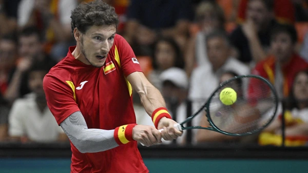 Spain's Pablo Carreno Busta returns the ball against Australia's Jordan Thompson during the group stage men's singles match between Australia and Spain of the Davis Cup tennis tournament at Fuente San Luis Sports Hall in Valencia on September 15, 2024.