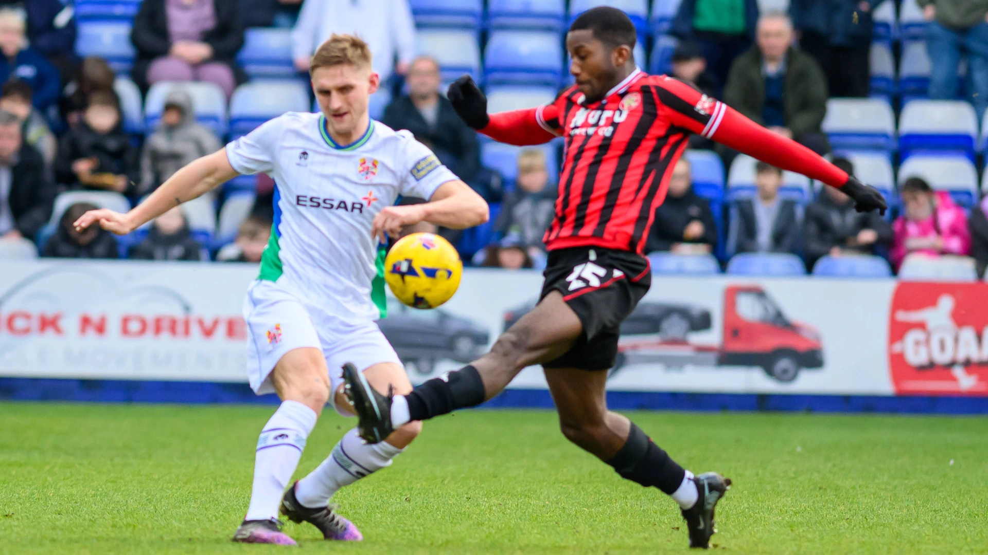 Daniel Kanu of Walsall FC tackles Nathan Smith of Tranmere Rovers FC during the Sky Bet League 2 match between Tranmere Rovers and Walsall at Prenton Park in Birkenhead, England, on January 17, 2026