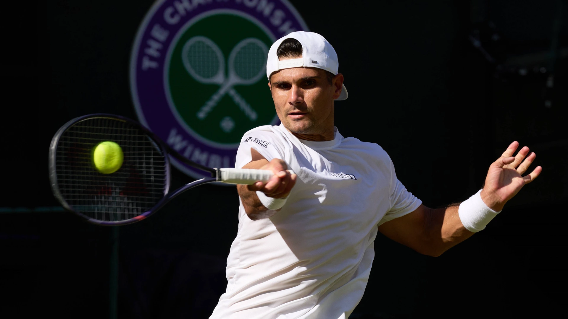 Marcos Giron of the United States plays a shot against Alexander Zverev of Germany in the third round during the 2026 Wimbledon, July 04, Day 6 at The all England club, Wimbledon on July 4, 2026