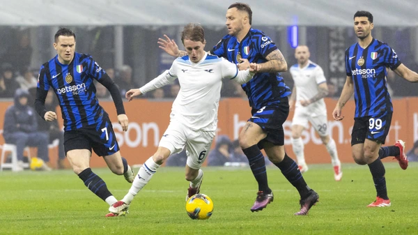 Nicolo Rovella and Marko Arnautovic are in action during the Coppa Italia match between FC Internazionale and Lazio in Milano, Italy, on February 25, 2025, at Giuseppe Meazza stadium. Milano