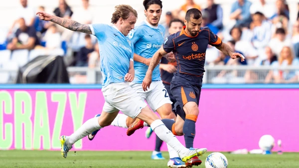 SS Lazio v FC Internazionale - Serie A Enilive Henrikh Mkhitaryan of FC Internazionale and Nicolo Rovella of SS Lazio compete for the ball during the serie Serie A Enilive match between SS Lazio and FC Internazionale at Olimpico on May 09, 2026