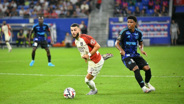 Georges Mikautadze (OL) and Andrey Santos (RC Strasbourg) during the French championship Ligue 1 football match between Olympique Lyonnais (Lyon) and RC Strasbourg on 30 August 2024