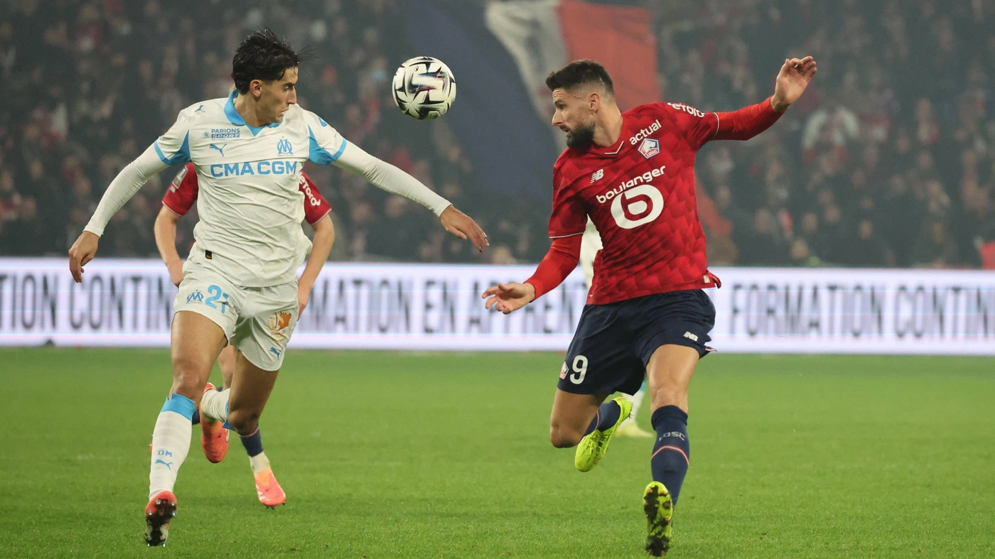LOSC Lille vs Olympique de Marseille - Ligue 1 J15 - 05/12/2025 Nayef AGUERD Marseille et Olivier GIROUD LOSC Lille lors du match LOSC Lille vs Olympique de Marseille, Ligue 1 J15, Decathlon Arena stade Pierre Mauroy, le 5 dà cembre 2025 -