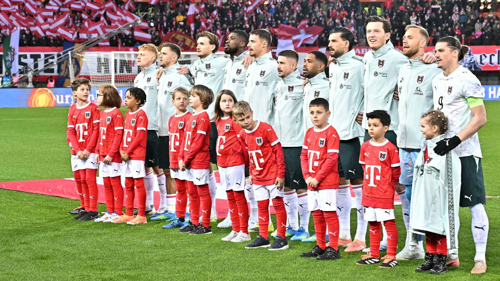 Team Austria stands for the national anthem prior to the start of the friendly football match Austria vs Ghana in Vienna, Austria, on March 27, 2026.