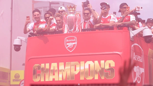 Arsenal's English midfielder #41 Declan Rice, Arsenal's Dutch defender #12 Jurrien Timber, Arsenal's Norwegian midfielder #08 Martin Odegaard, Arsenal's Spanish manager Mikel Arteta, Arsenal's French defender #02 William Saliba and Arsenal's Brazilian defender #06 Gabriel Magalhaes celebrate with the Premier League trophy during a victory parade around the streets near to the Emirates Stadium, in London, on May 31, 2026. 