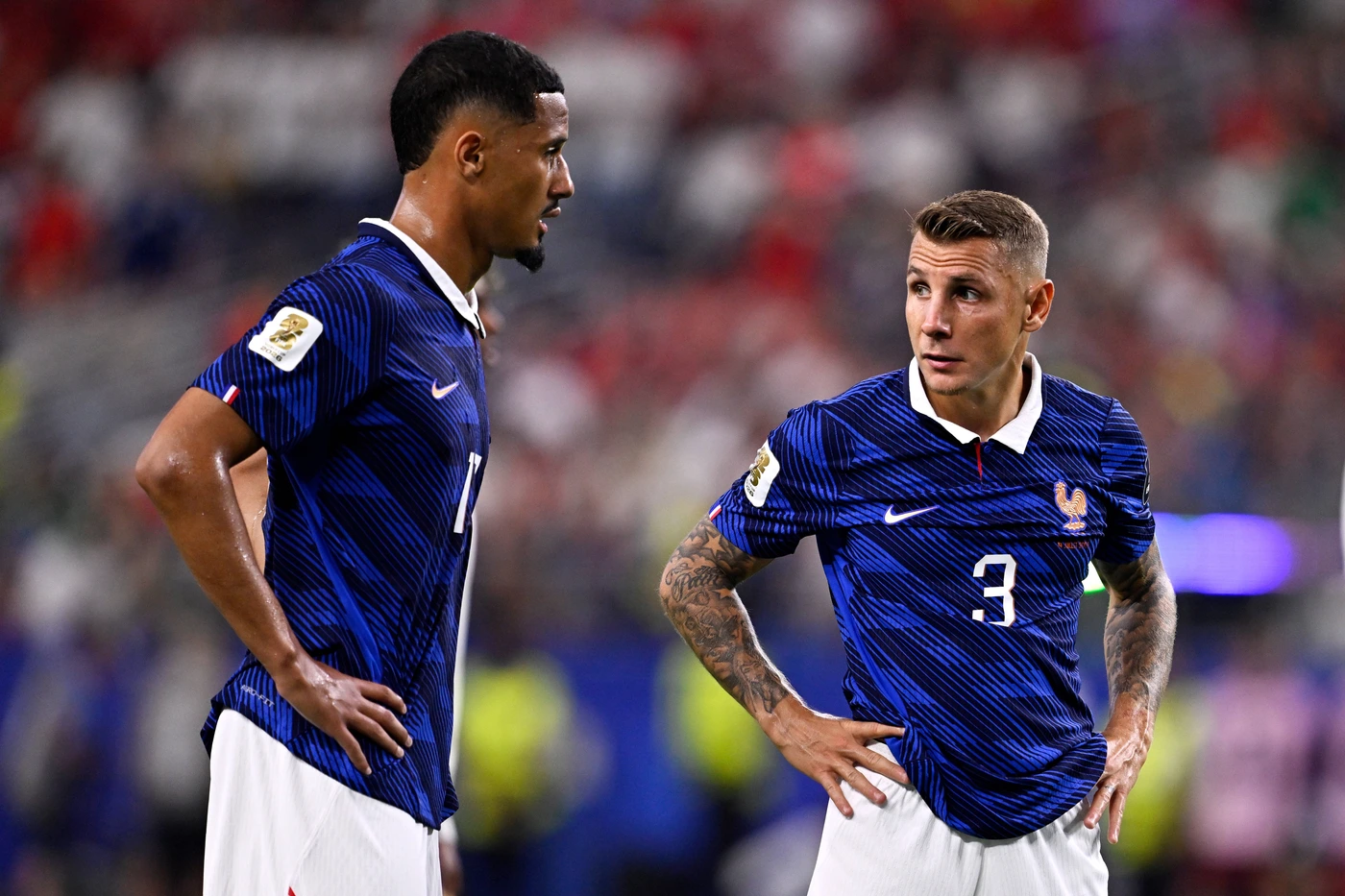 2026-07-14 France v Spain - Semi Final - FIFA World Cup, WM, Weltmeisterschaft, Fussball 2026 ARLINGTON, UNITED STATES - JULY 14: William Saliba of France, Lucas Digne of France looks dejected duri...