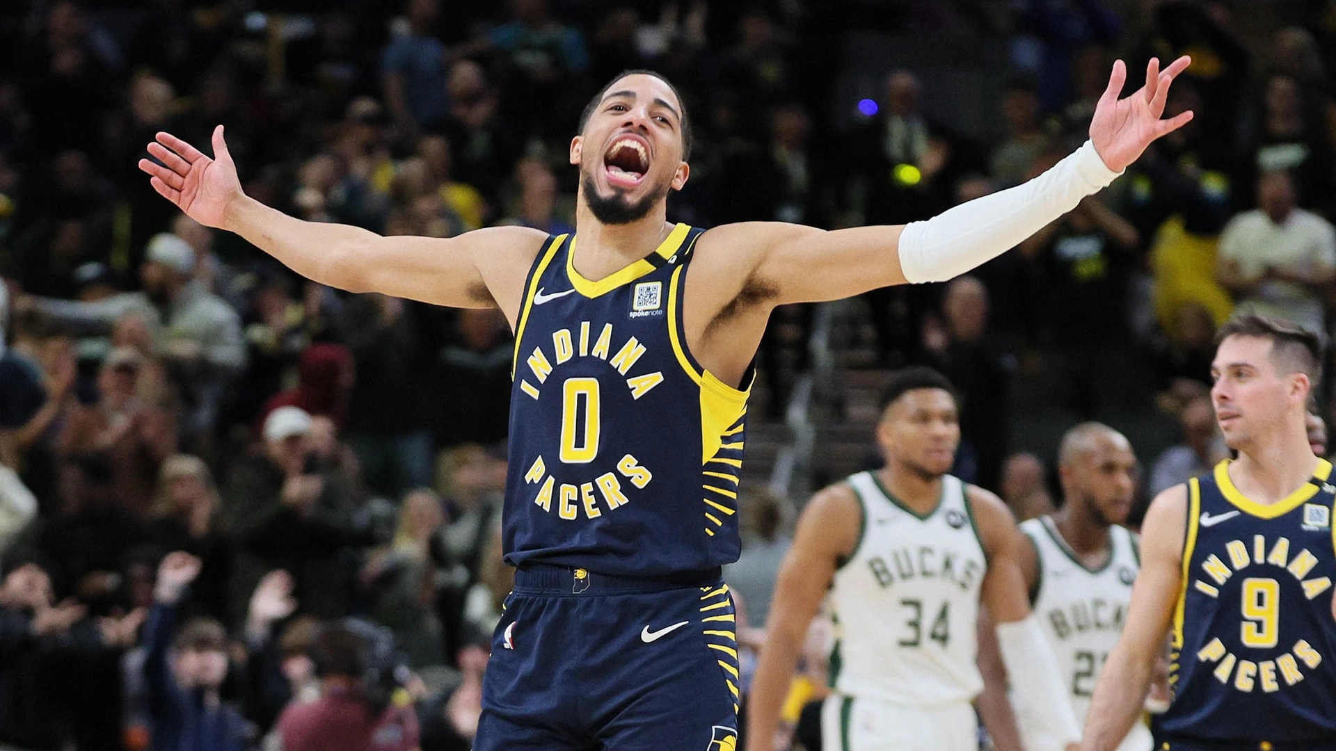 INDIANAPOLIS, INDIANA - JANUARY 03: Tyrese Haliburton #0 of the Indiana Pacers celebrates in the fourth quarter of the 142-130 win against the Milwaukee Bucks at Gainbridge Fieldhouse on January 03, 2024 in Indianapolis, Indiana.