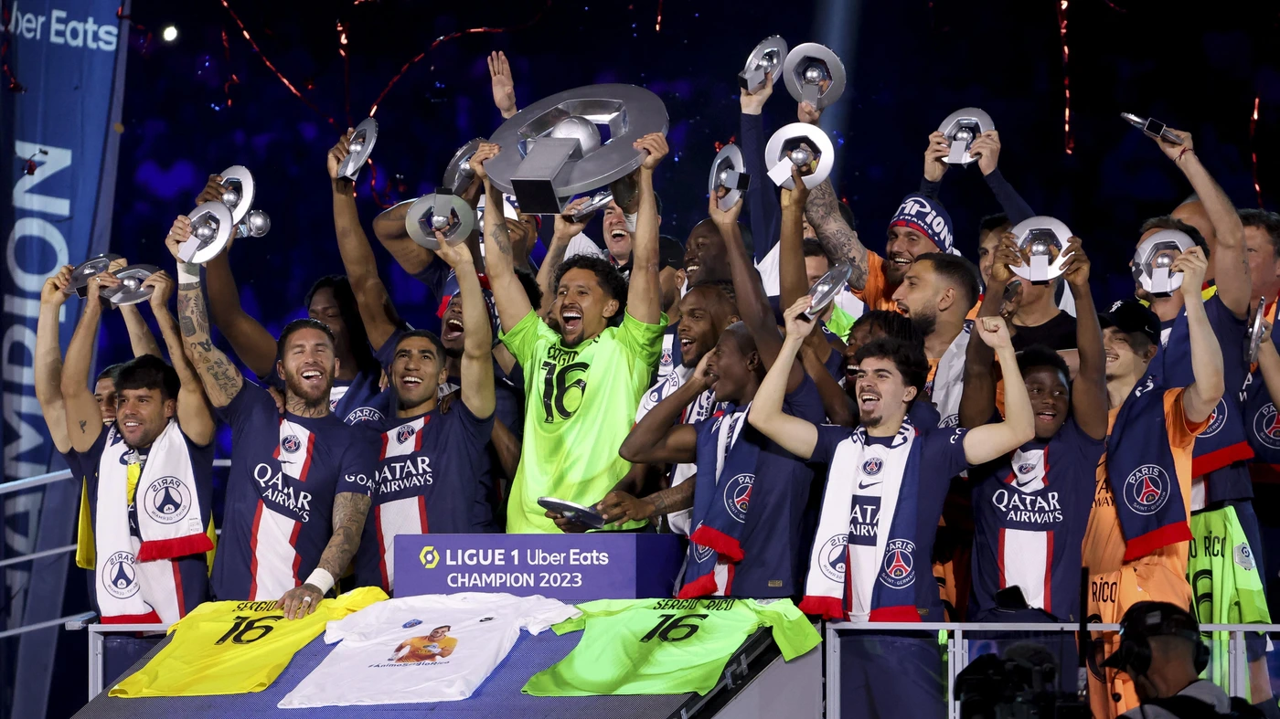 Marquinhos of PSG and teammates celebrate during the trophy ceremony following the French championship Ligue 1 football match between Paris Saint-Germain (PSG) and Clermont Foot 63 on June 3, 2023 at Parc des Princes stadium in Paris, France.