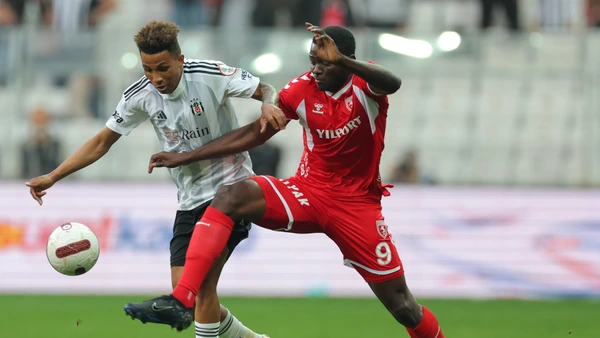 Istanbul, Turkey, April 13th 2024: Gedson Fernandes 83 Besiktas and Marius MouandÂilmadji 9 Samsunspor during the Turkish Super League football match between Besiktas and Samsunspor at Tupras Stadium, Turkey.