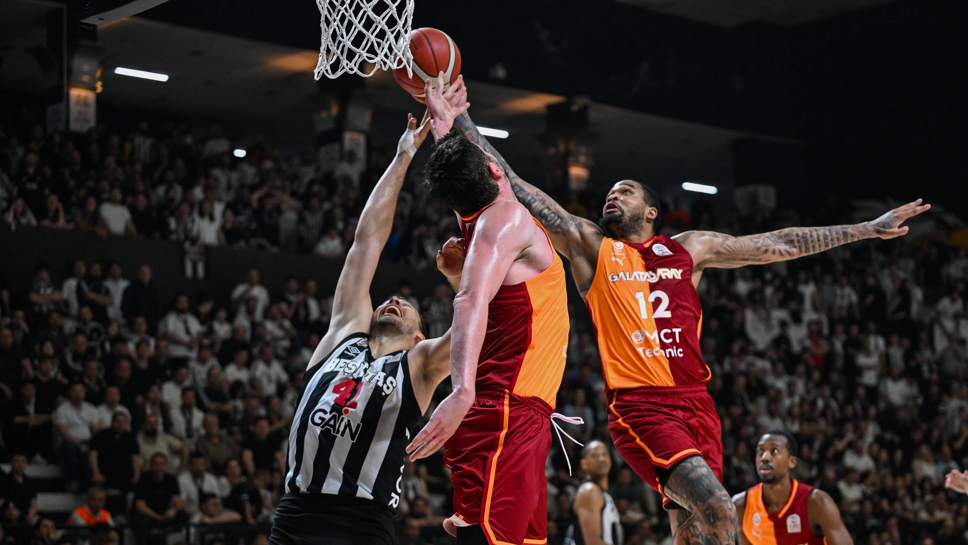 May 27, 2026 -- Ante Zizic front L of Besiktas and James Palmer front R of Galatasaray battle for a rebound during the game 1 of the quarterfinals of the Turkish Basketball Super League between Besiktas and Galatasara