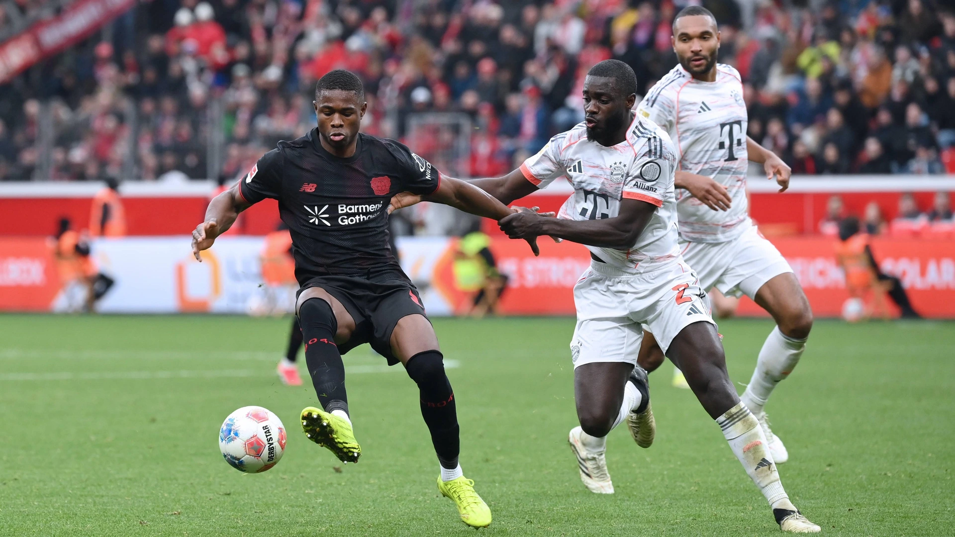 Christian Kofane Bayer 04 Leverkusen, Dayot Upamecano Bayern Muenchen, Jonathan Tah Bayern Muenchen, 14.03.2026,  Bundesliga, Saison 2025/2026, Bayer 04 Leverkusen - FC Bayern München 1:1