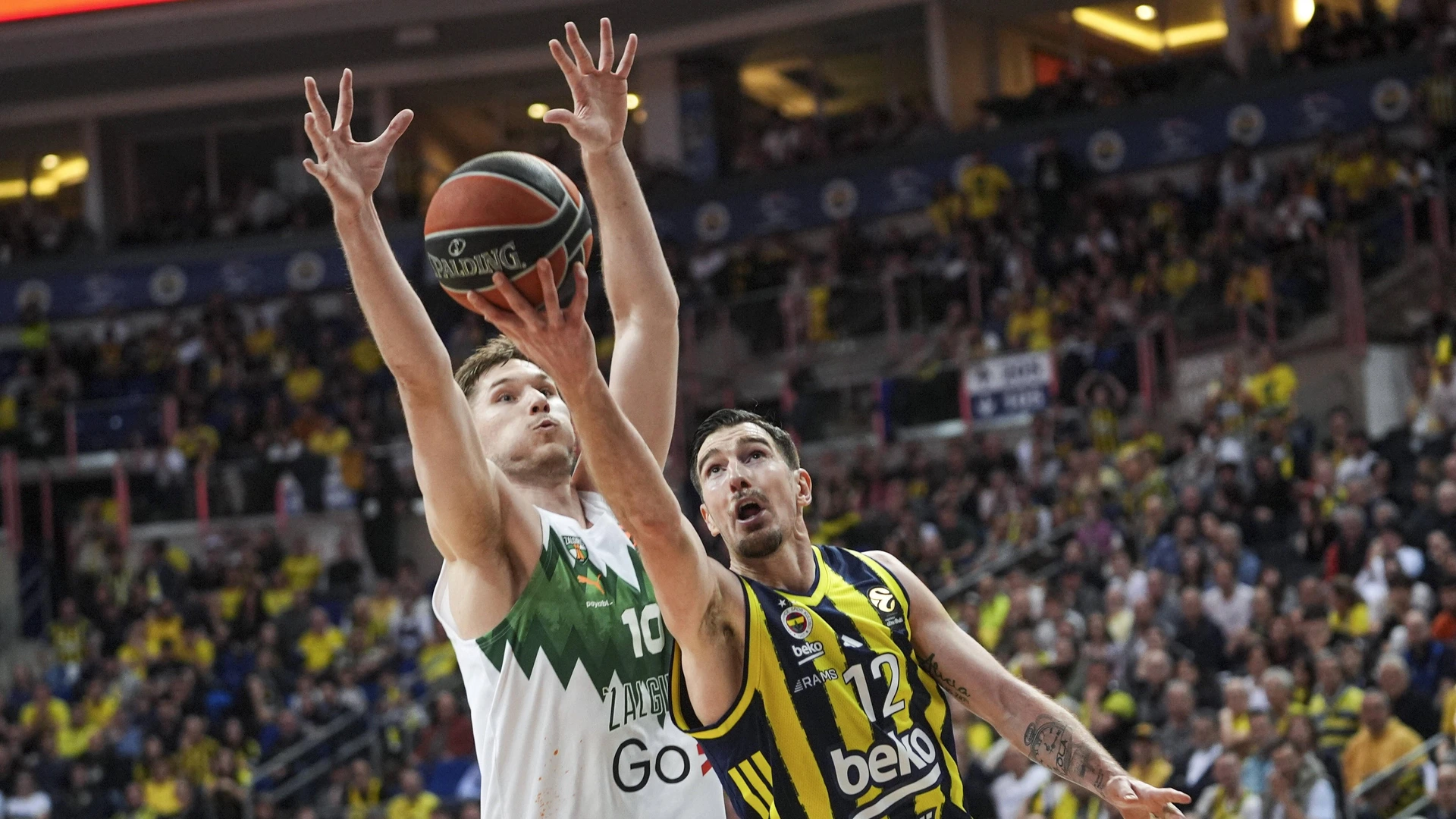 Nando de Colo 12 of Fenerbahce Beko in action against Azuolas Tubelis 10 of Zalgiris during the EuroLeague Round 34 basketball game between Fenerbahce Beko and Zalgiris at Ulker Sports and Event Hall in Istanbul, Turkiye on March 27, 2026.