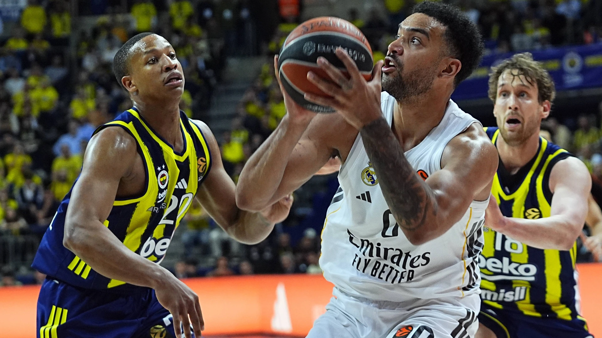 Devon Howard Hall 20 of Fenerbahce Beko in action against Trey Lyles 0 of Real Madrid during EuroLeague week 37 basketball match between Fenerbahce Beko and Real Madrid at Ulker Sports and Event Hall in Istanbul, Turkiye on April 9, 2026