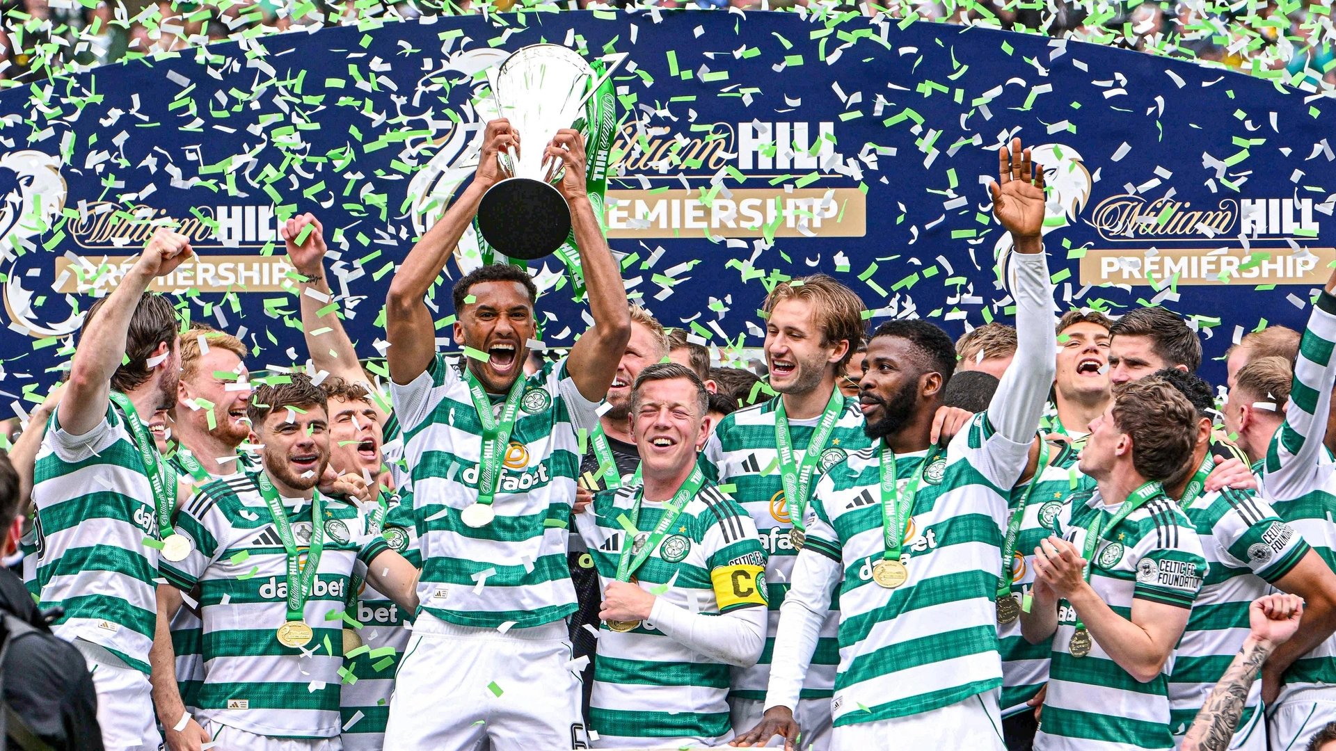 Celtic v Heart of Midlothian William Hill Premiership Auston Trusty of Celtic lifts the William Hill Premiership trophy during the William Hill Premiership match at Celtic Park, Glasgow 16/05/2026