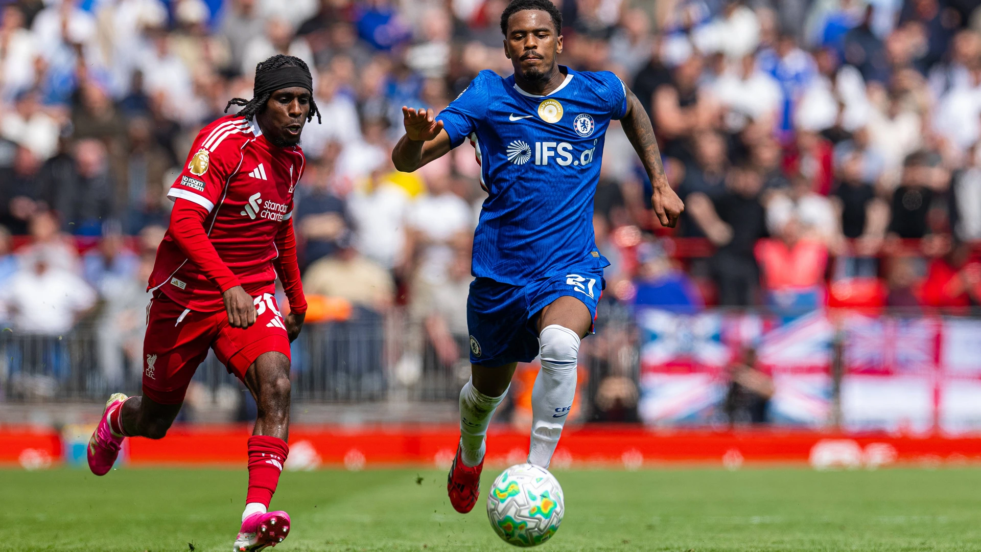 Chelsea s Jorrel Hato R and Liverpool s Jeremie Frimpong during the FA Premier League match between Liverpool FC and Chelsea FC at Anfield.