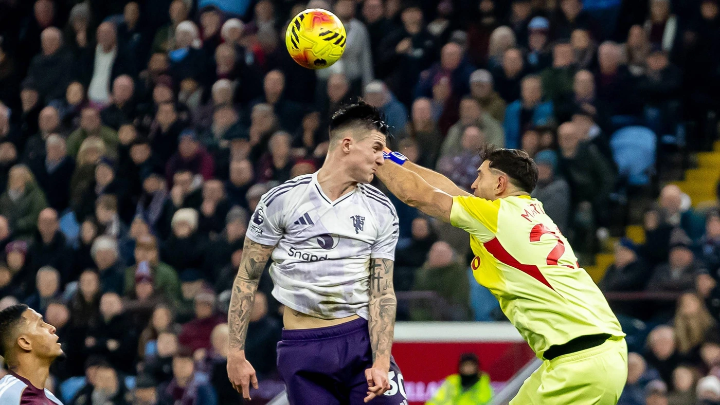 Aston Villa v Manchester United, Aston Villa goalkeeper Emiliano Martinez 23 punches ball out during the Premier League match between Aston Villa and Manchester United at Villa Park, Birmingham, England on 21 December 2025.