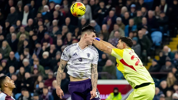 Aston Villa v Manchester United, Aston Villa goalkeeper Emiliano Martinez 23 punches ball out during the Premier League match between Aston Villa and Manchester United at Villa Park, Birmingham, England on 21 December 2025.