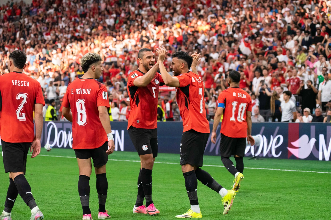 VANCOUVER, CANADA - JUNE 21: Rami Rabia of Egypt and Trezeguet of Egypt high give after Trezeguet of Egypt scores their third goal during the FIFA World Cup, WM, Weltmeisterschaft, Fussball 2026 gr...