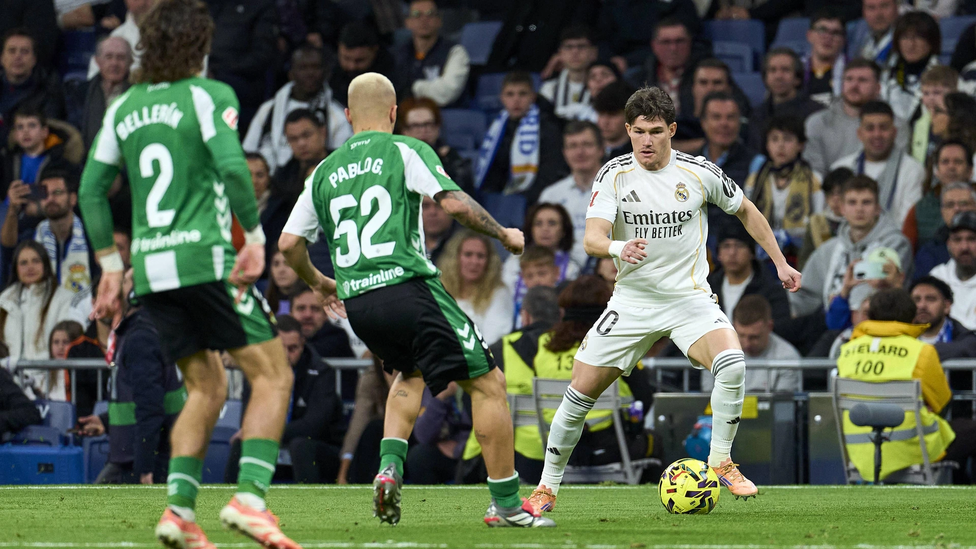Fran Garcia of Real Madrid CF battles for the ball with Pablo Garcia of Real Betis Balompie during the La Liga EA match between Real Madrid CF and Real Betis Balompie at Bernabeu stadium on January 4th, 2026.
