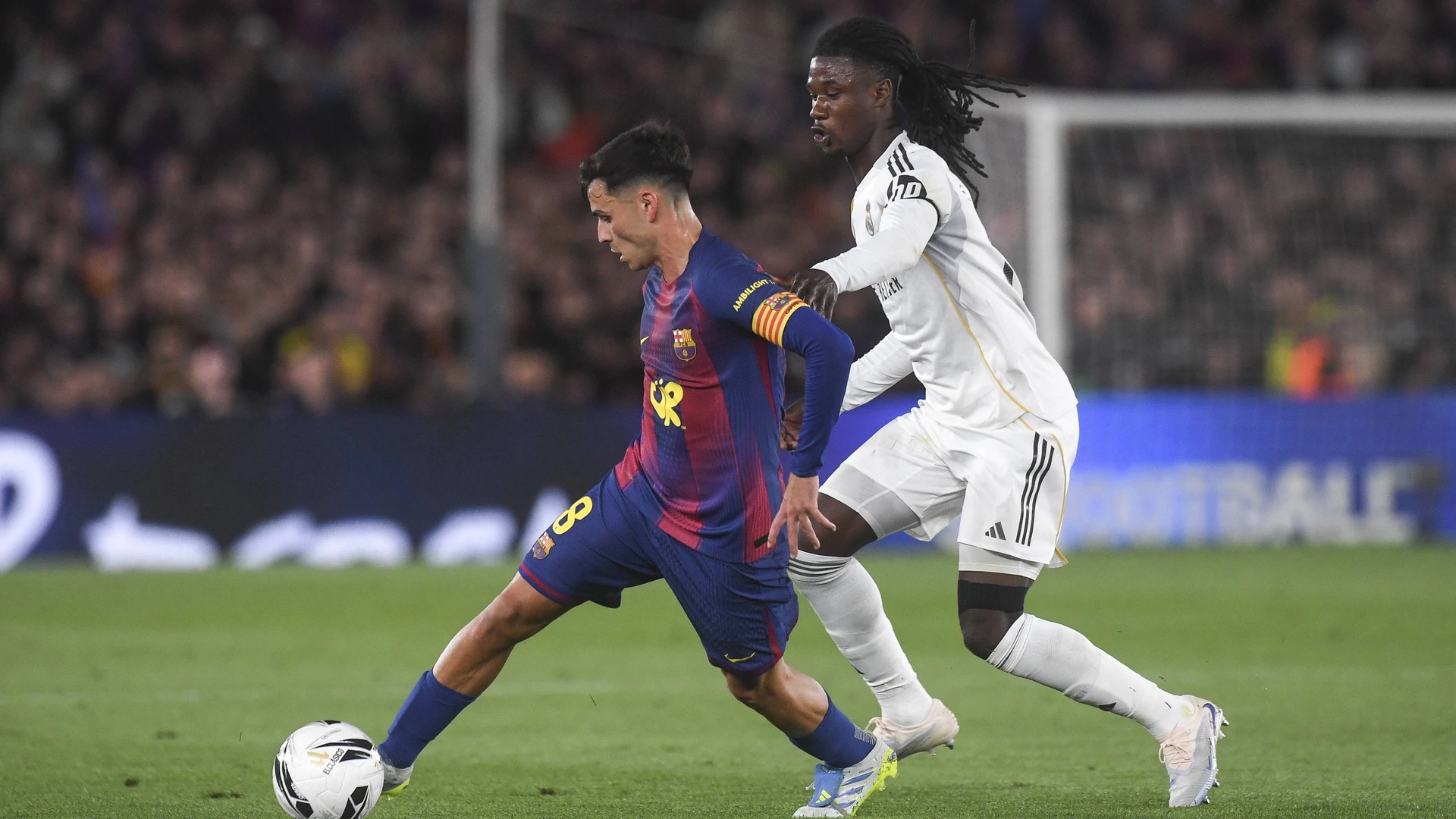 Pedri of Barcelona brings the ball foward against Eduardo Camavinga of Real Madrid during LaLiga EA Sports, between FC Barcelona, Barca v Real Madrid played at Spotify Camp Nou Stadium, Barcelona on May 10th, 2026