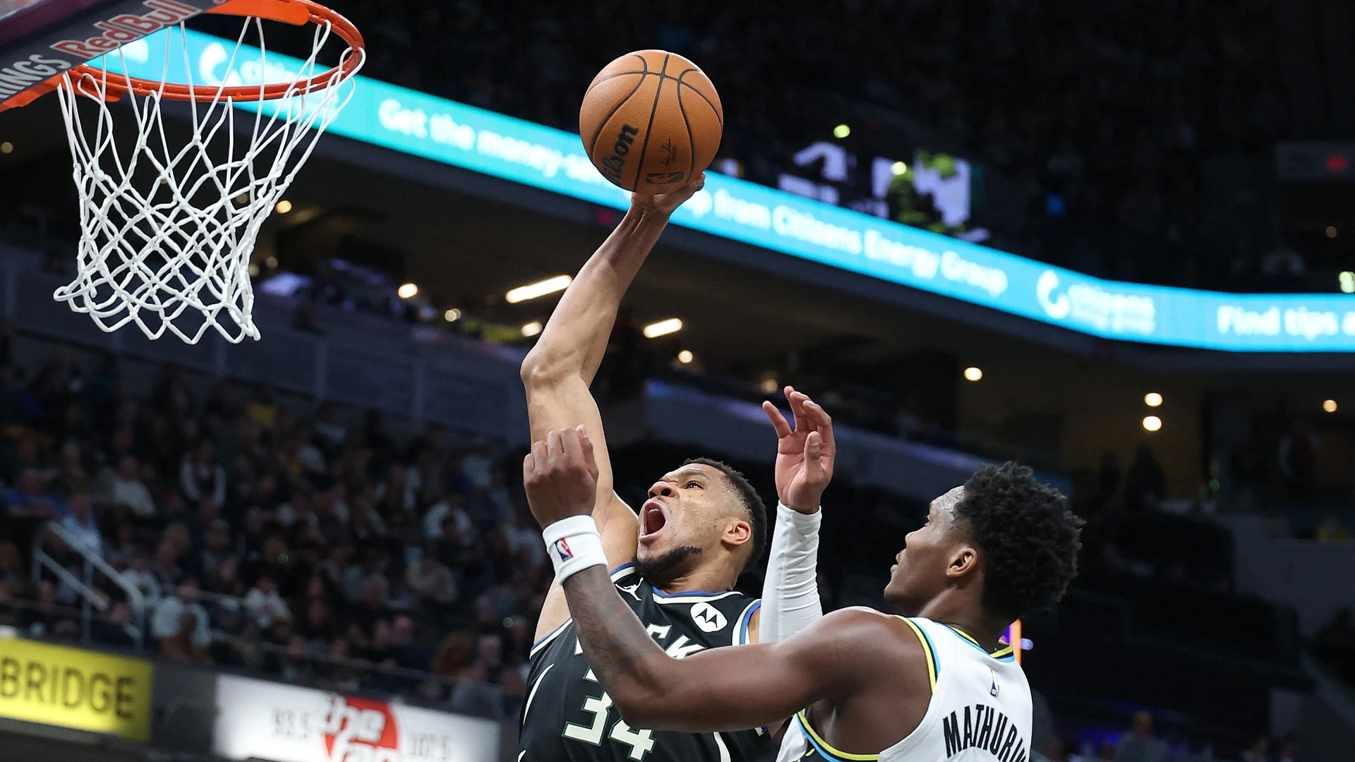 INDIANAPOLIS, INDIANA - DECEMBER 31: Giannis Antetokounmpo #34 of the Milwaukee Bucks shoots the ball while defended by Bennedict Mathurin #00 of the Indiana Pacers of the at Gainbridge Fieldhouse on December 31, 2024 in Indianapolis, Indiana.