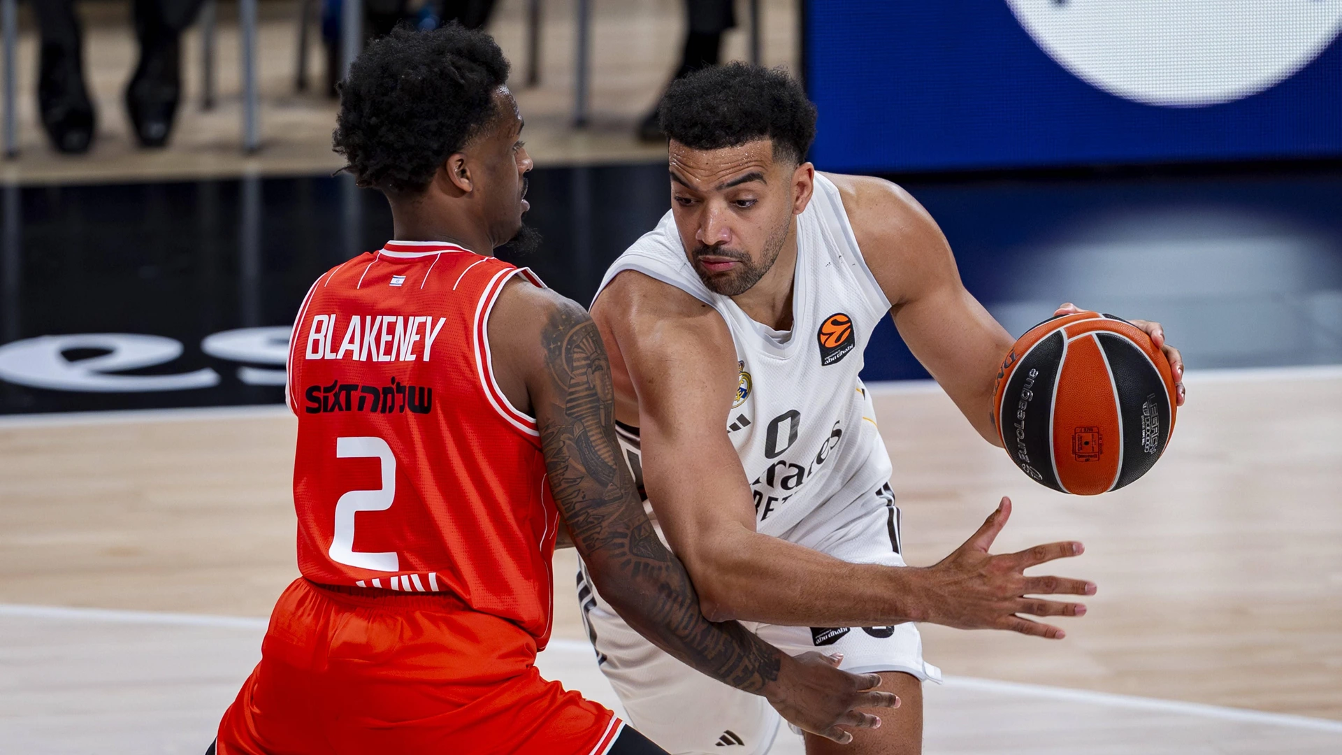 Real Madrid v Hapoel Ibi Tel Aviv - Euroleague 2025/2026 Trey Lyles of Real Madrid R in action with the ball defended by Antonio Blakeney of Hapoel Ibi Tel Aviv L during the EuroLeague Regular Season Round 33 match