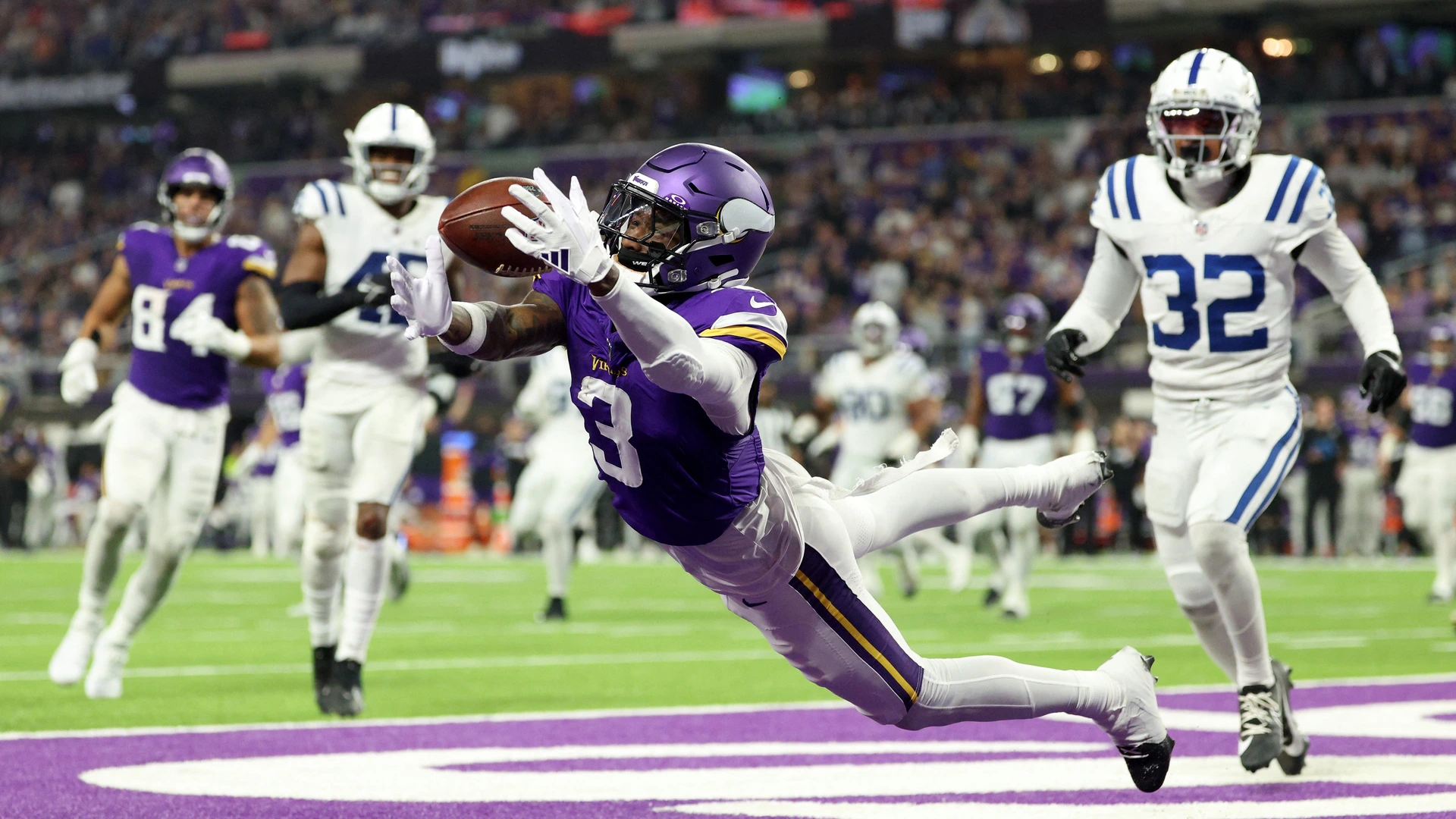 Jordan Addison #3 of the Minnesota Vikings catches a touchdown pass during the third quarter against the Indianapolis Colts at U.S. Bank Stadium on November 03, 2024