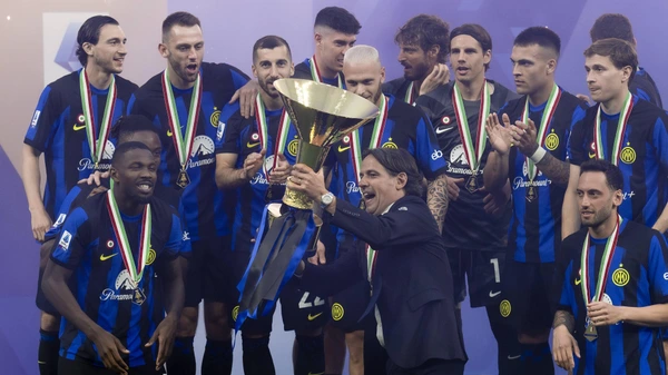 Serie A Simone Inzaghi, head coach of FC Internazionale, lifts the Scudetto trophy during the award ceremony at the end of the Serie A football match between FC Internazionale and SS Lazio. Milan