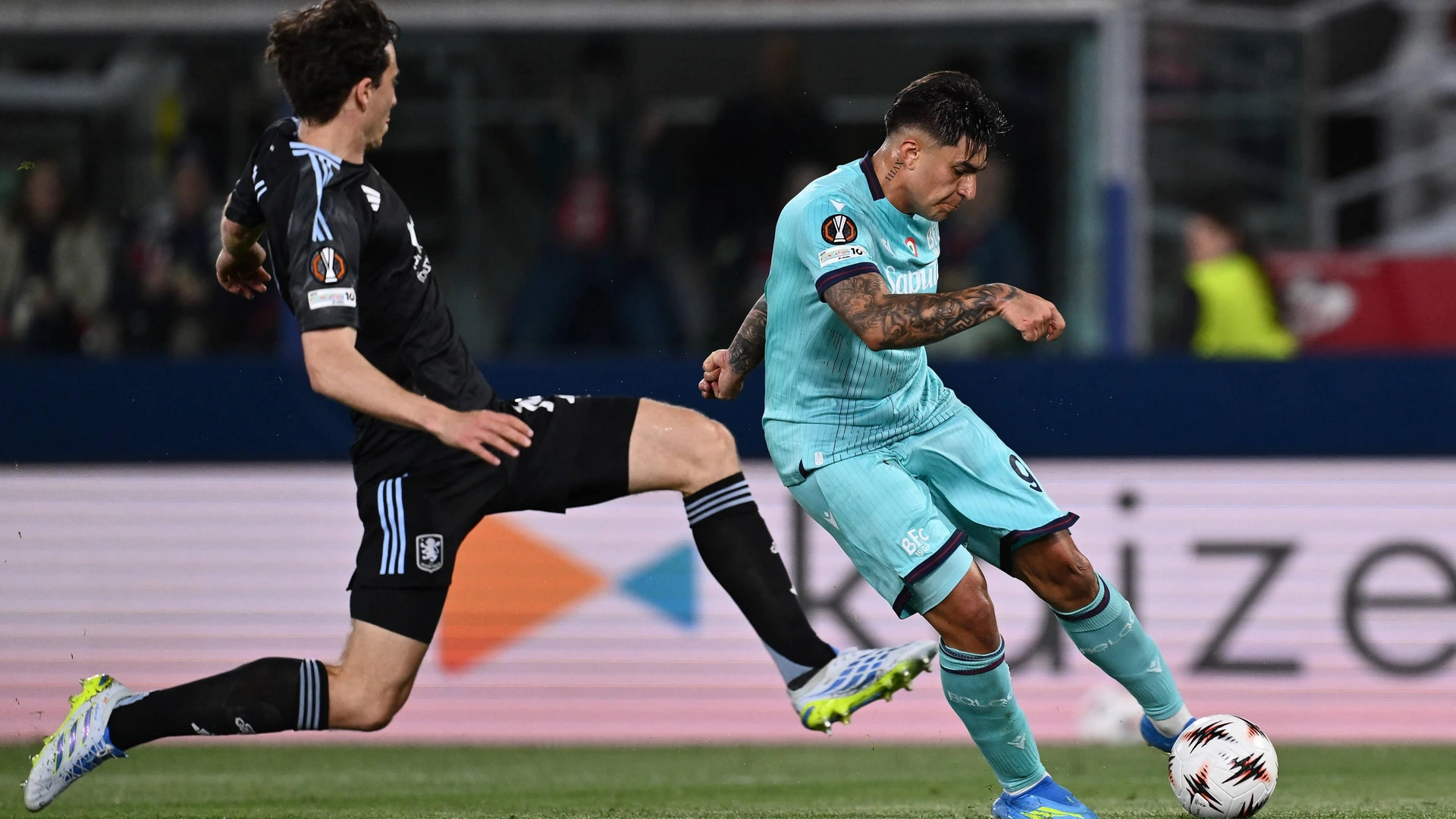 Santiago Castro of Bologna F.C. and Pau Torres of Aston Villa F.C. are in action during the UEFA Europa League Quarter-finals first leg football match between between Bologna F.C. and Aston Villa F.C. on April 9, 2026 in Bologna, Italy.