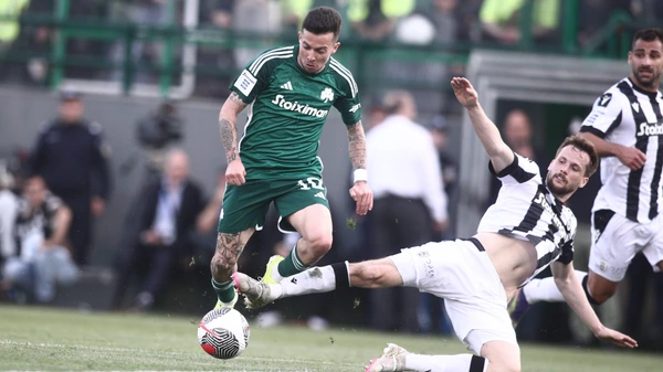 Bernard of Panathinaikos FC in action against Tomasz Kedziora of PAOK during the SuperLeague playoffs soccer match between Panathinaikos FC and PAOK held at Apostolos Nikolaidis Stadium in Athens, Greece, 31 March 2024.