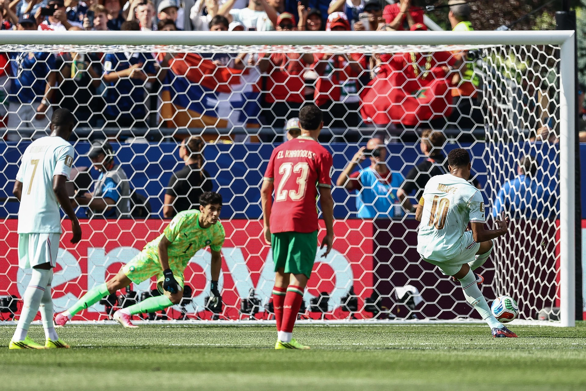 France's forward #10 Kylian Mbappe (R) shoots and misses a penalty during the 2026 World Cup football tournament quarter-final match between France and Morocco on July 9, 2026.