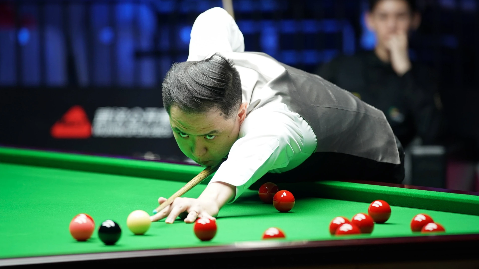  Xiao Guodong of China plays a shot during his 5-0 victory against Wang Xinbo of China in the round of 64 at the 2026 Wuhan Open on August 23, 2026 in Wuhan