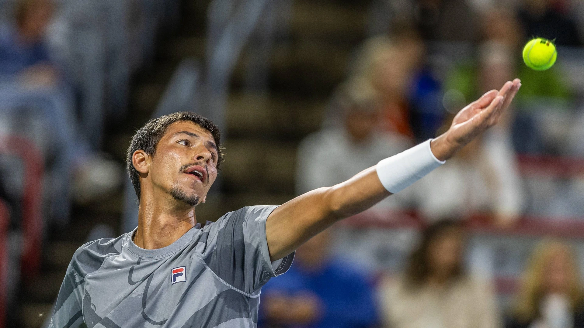 ALEXEI POPYRIN from Australia serving in first set against Sebastian Korda from USA in semi final final of Canadian Open at IGA Stadium in Montreal, Quebec, Canada
