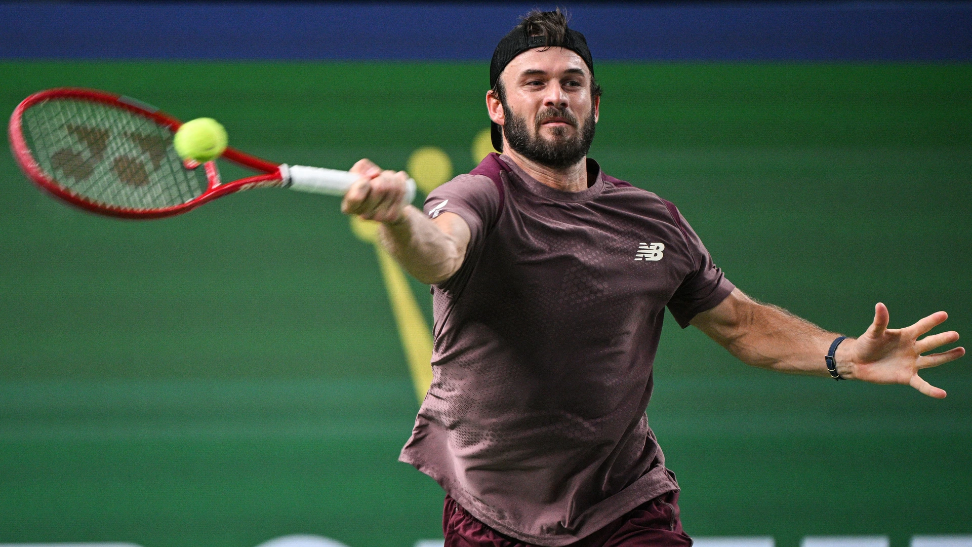 USA's Tommy Paul hits a return to Belgium's Zizou Bergs during their men's singles match at the Shanghai Masters tennis tournament in Shanghai on October 14, 2026.