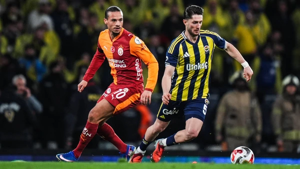 Galatasaray player Leroy Sane L and Fenerbahce player Ismail Yuksek R are in action during the Turkcell Super Cup final between Galatasaray and Fenerbahce at Ataturk Olympic Stadium in Istanbul, Turkiye, on January 10, 2026.