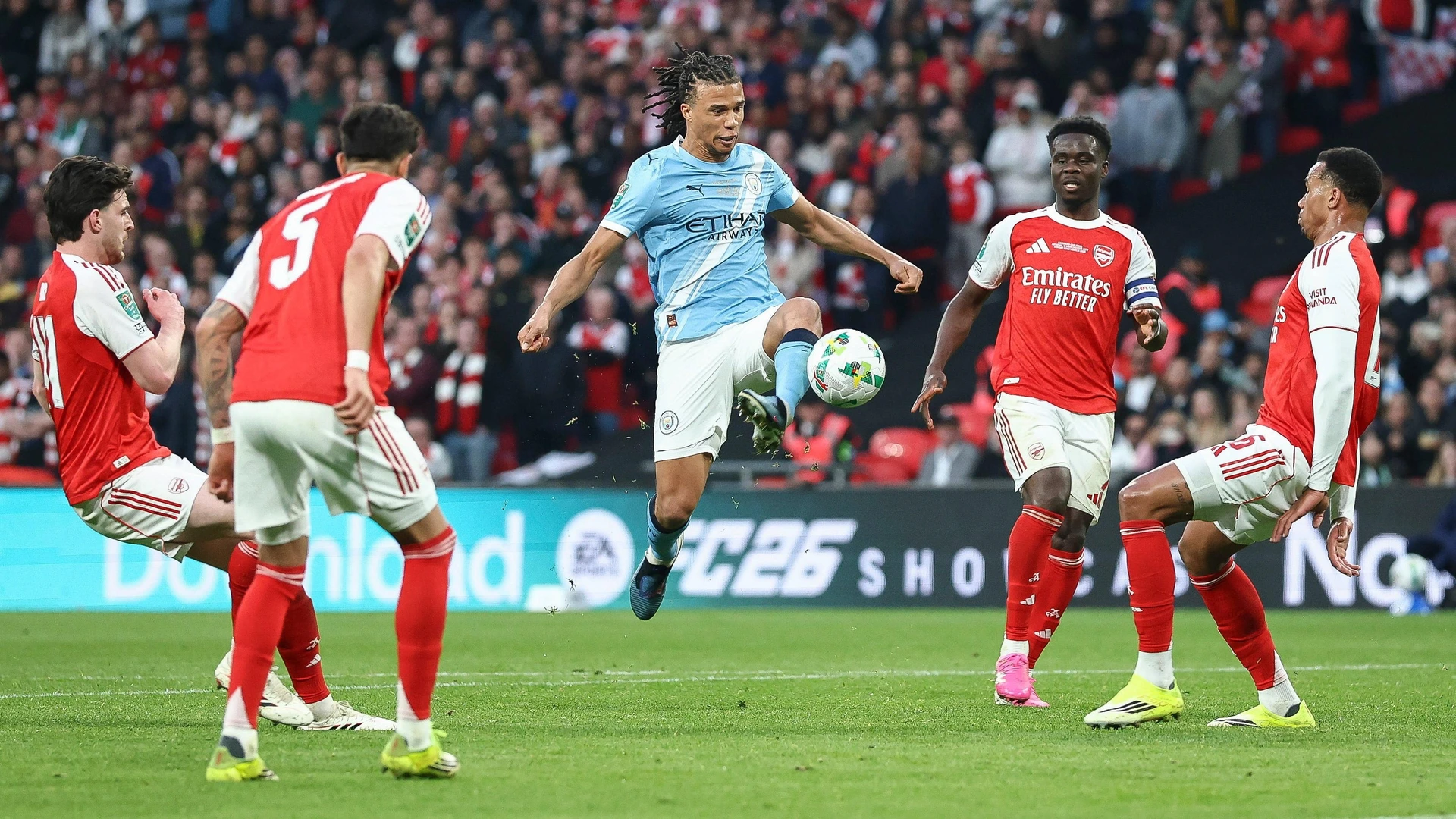 Arsenal v Manchester City, Carabao Cup Final Nathan Ake of Manchester City shoots at goal, blocked by Gabriel Magalhaes of Arsenal during the Arsenal v Manchester City Carabao Cup Final match at Wembley Stadium, London, England on 22 March 2026