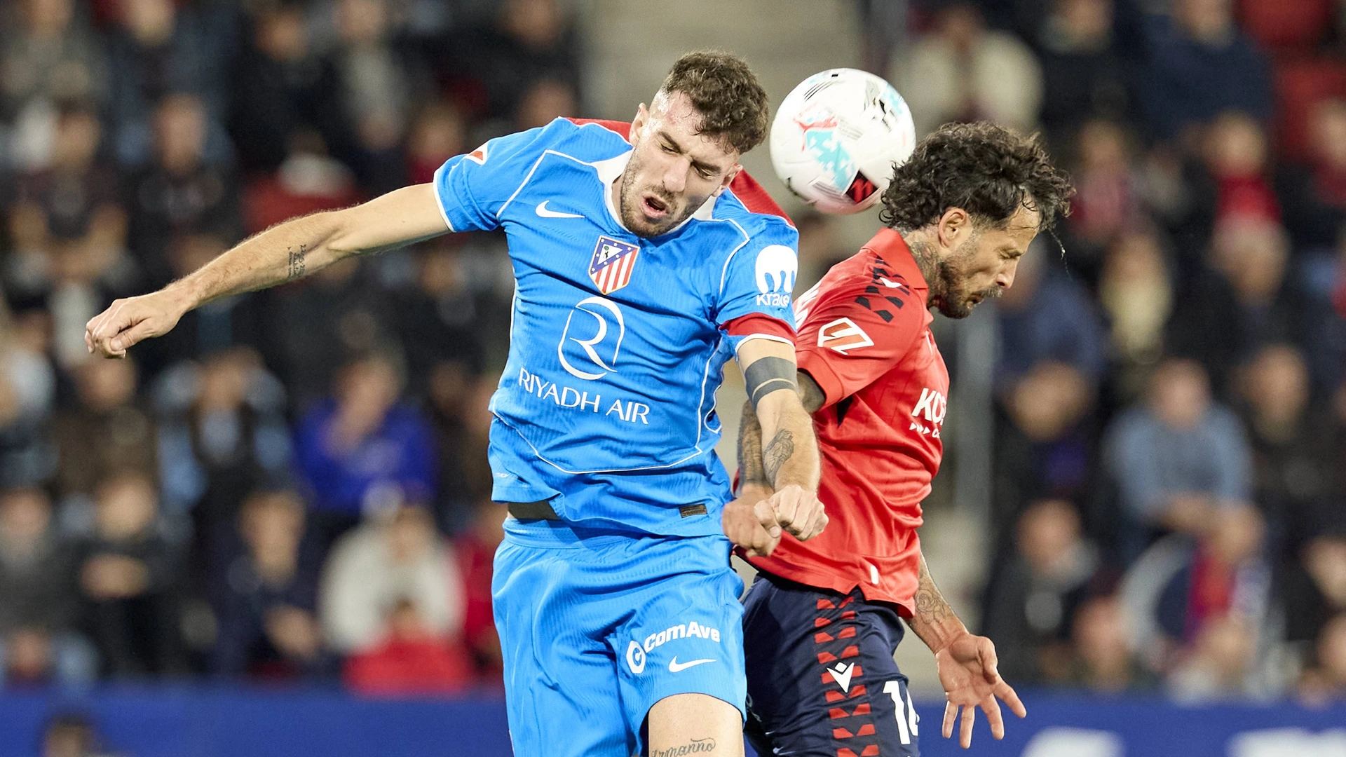 12 MAY 2026. Dávid Hancko of Atletico Madrid and Ruben García of CA Osasuna seen in action during the Spanish football league match between CA Osasuna and Club Atletico Madrid