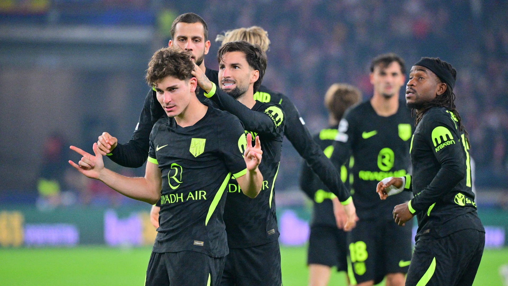 Julián Alvarez (left, Atlético Madrid) celebrates with his teammates after scoring the goal that tied the game at 1-1 20 October 2026