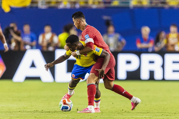Jhon Arias of Colombia (L) and Cristiano Ronaldo of Portugal (R) fight for possession during the FIFA World Cup, WM, Weltmeisterschaft, Fussball 2026 Group K match between Colombia and Portugal at ...