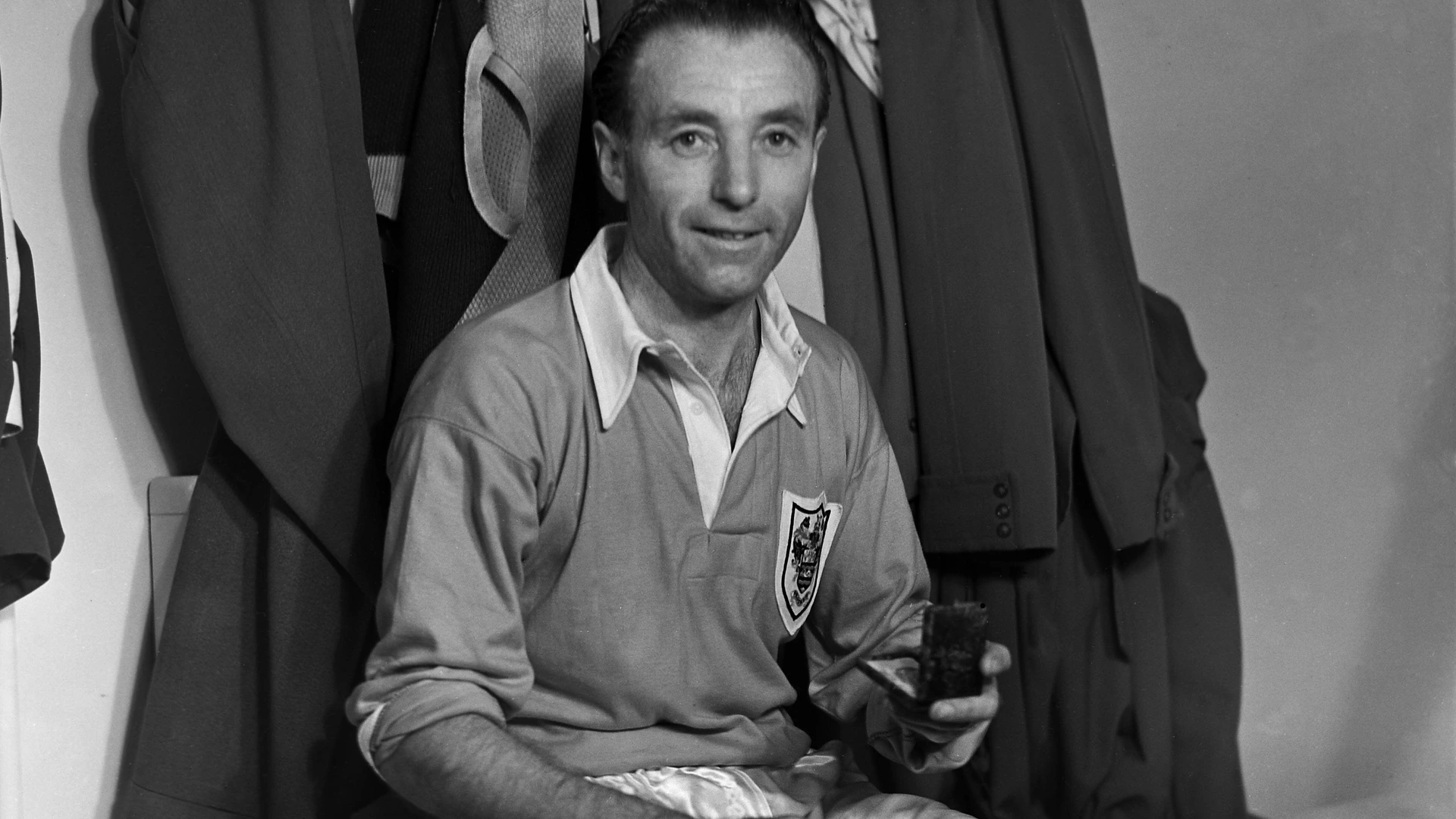 Football - 1953 FA Cup Final - Blackpool 4 Bolton Wanderers 3 Stanley Matthews with his FA Cup winners medal in the changing rooms at Wembley. 02/05/1953