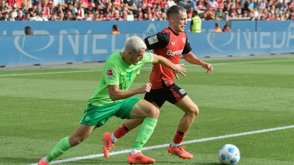 Jakub Kaminski Wolfsburg 16 Florian Wirtz Leverkusen 10 22 09 2024 Soccer Bayer 04 Leverkusen vs VfL Wolfsburg, BayArena, Leverkusen.