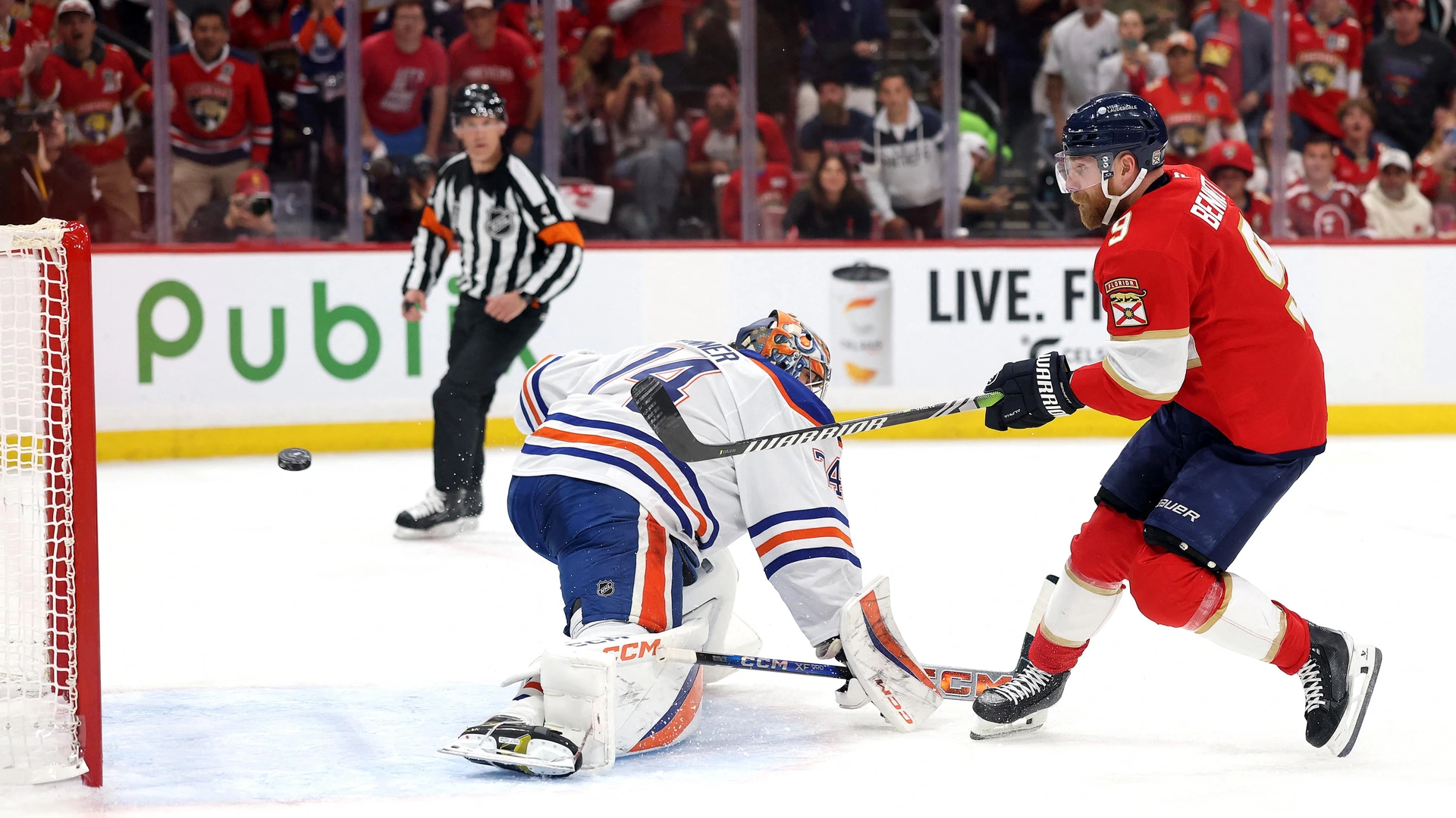 SUNRISE, FLORIDA - JUNE 09: Sam Bennett #9 of the Florida Panthers scores on Stuart Skinner #74 of the Edmonton Oilers during the second period in Game Three of the 2025 Stanley Cup Final at Amerant Bank Arena on June 09, 2025 in Sunrise, Florida.
