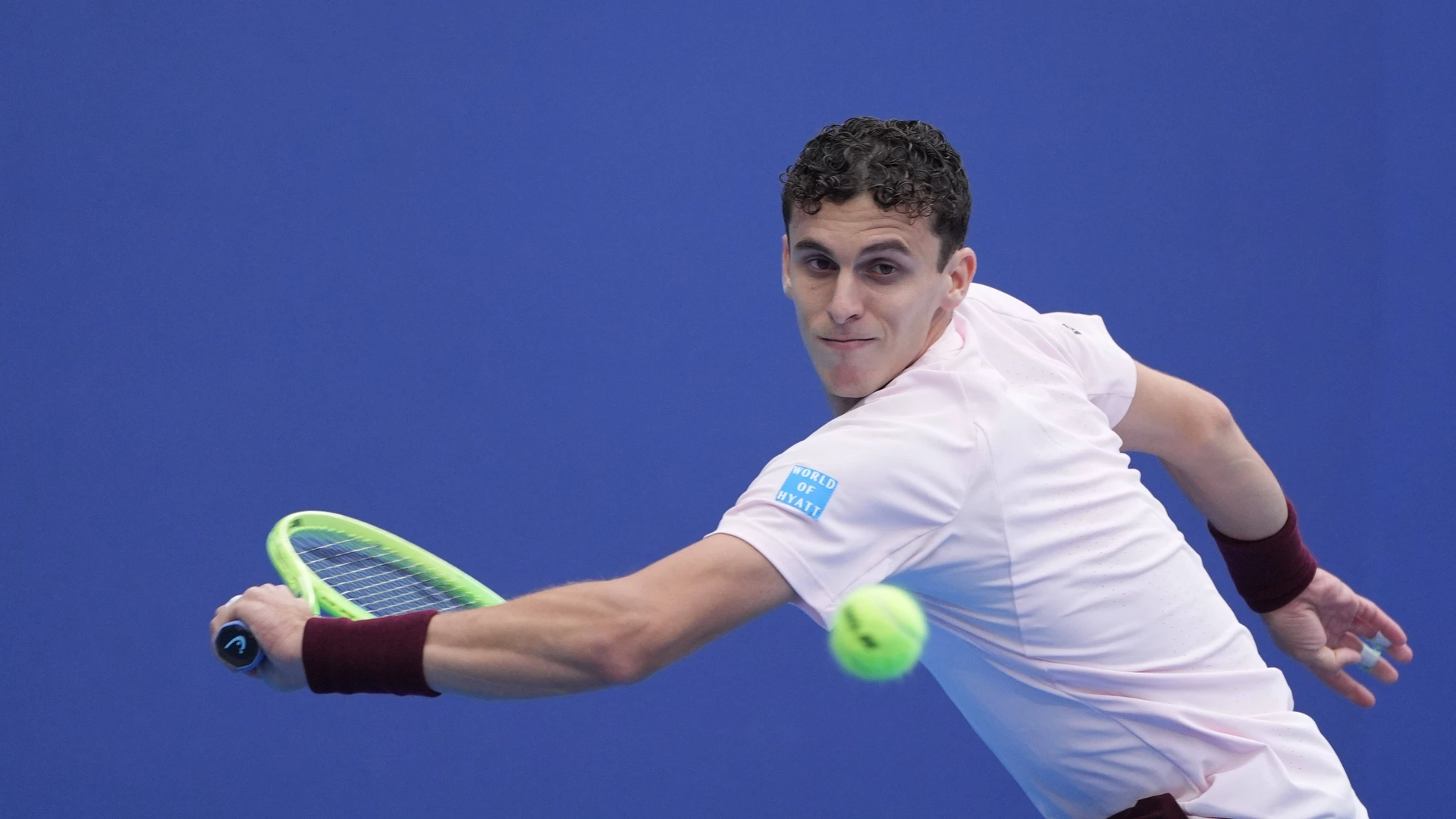 Juan Manuel Cerundolo of Argentina hits a return during the men s singles first round match against Bu Yunchaokete of China at 2026 China Open tennis tournament in Beijing, China, Sept. 30, 2026.