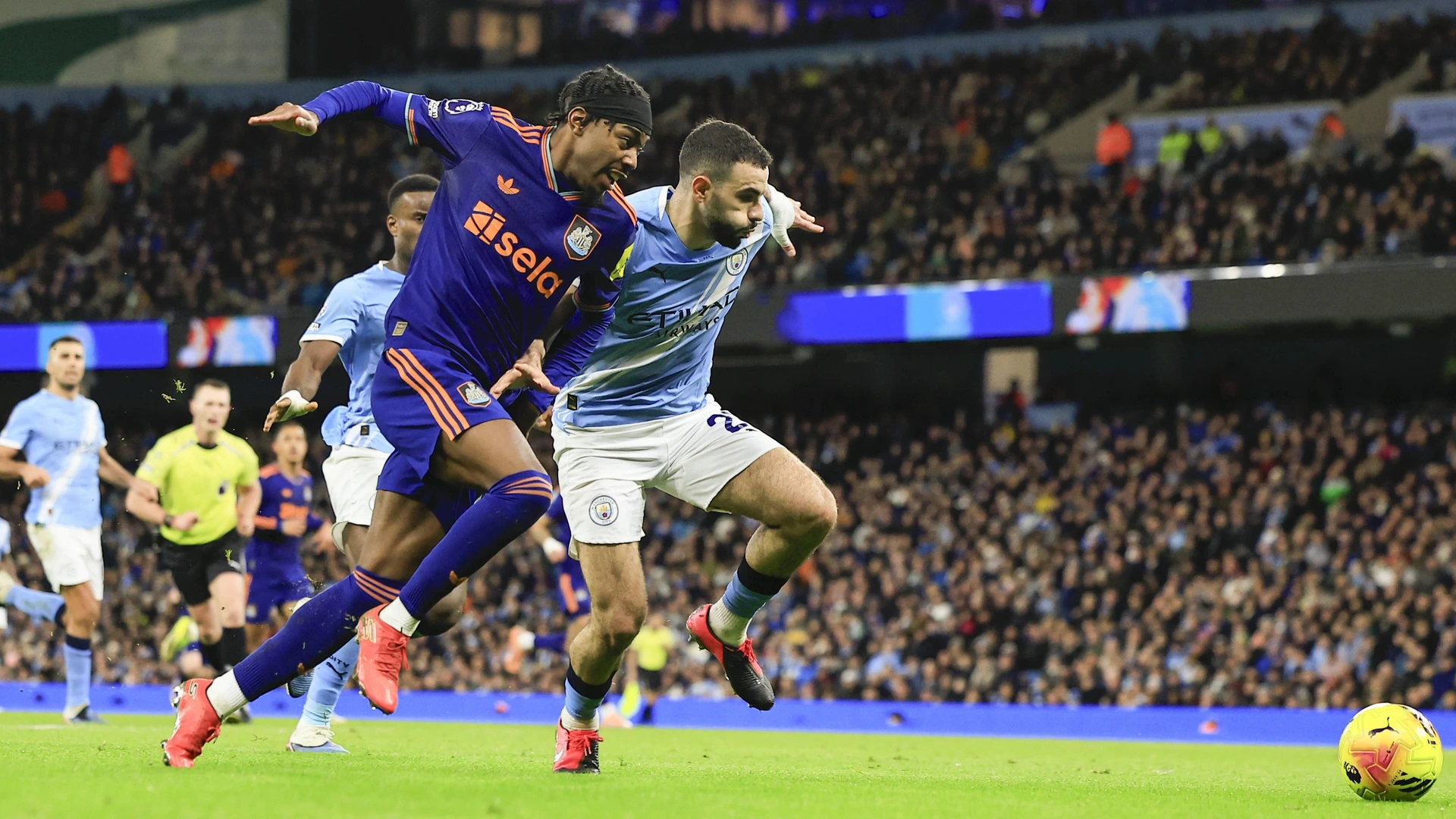 Manchester City v Newcastle United, Premier League Anthony Elanga 20 of Newcastle United and Rayan Ait-Nouri 21 of Manchester City challenge for the ball during the Premier League match between Manchester City and Newcastle United on 21 February 2026.