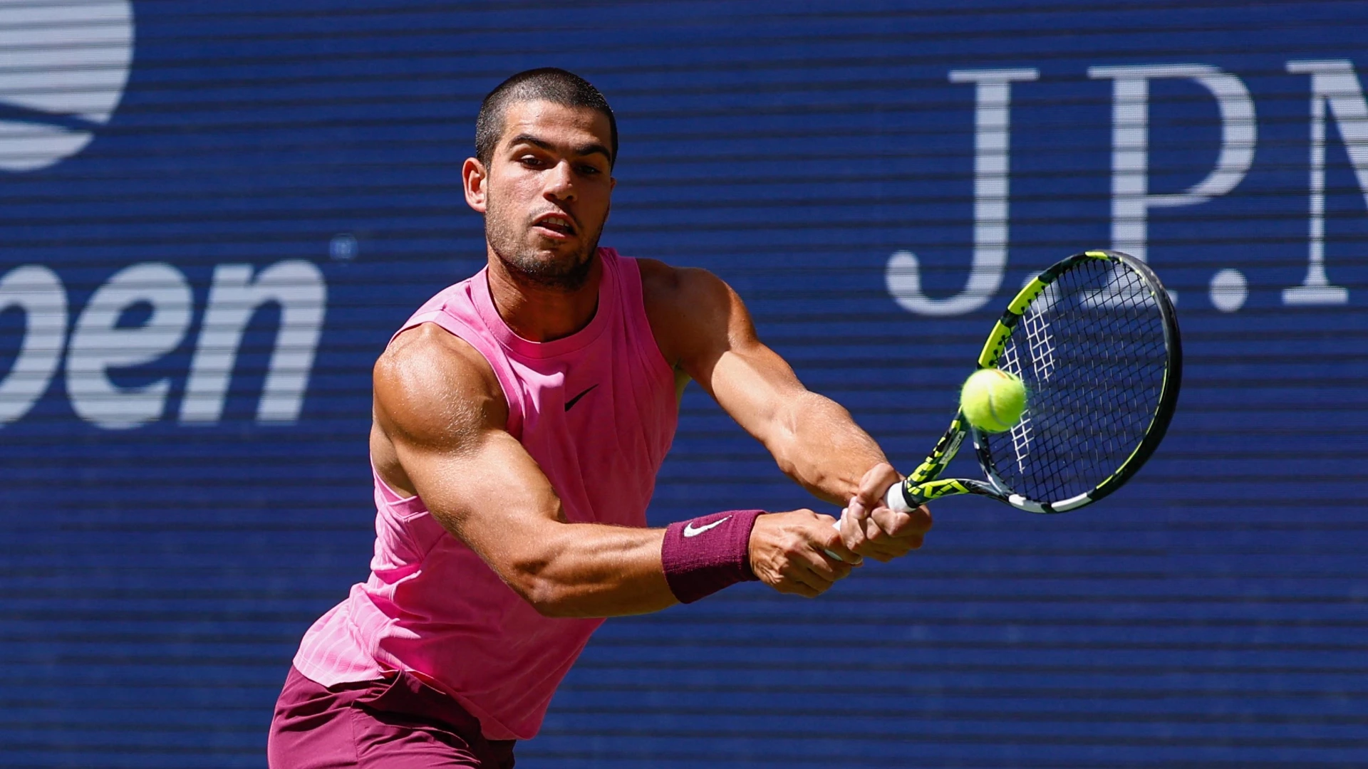 Spain's Carlos Alcaraz plays a backhand return to Czech Republic’s Jiri Lehecka during their men's singles quarterfinal tennis match on day ten of the US Open tennis tournament at the USTA Billie Jean on September 2, 2025.