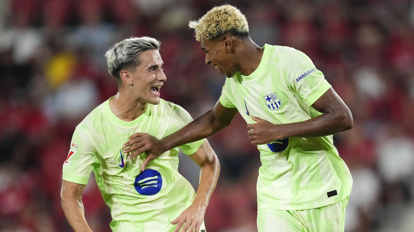 Lamine Yamal of Barcelona and Spain celebrates after scoring his sides first goal during the LaLiga EA Sports match between RCD Mallorca and FC Barcelona at Estadio de Son Moix on August 17, 2025 in Mallorca, Spain.