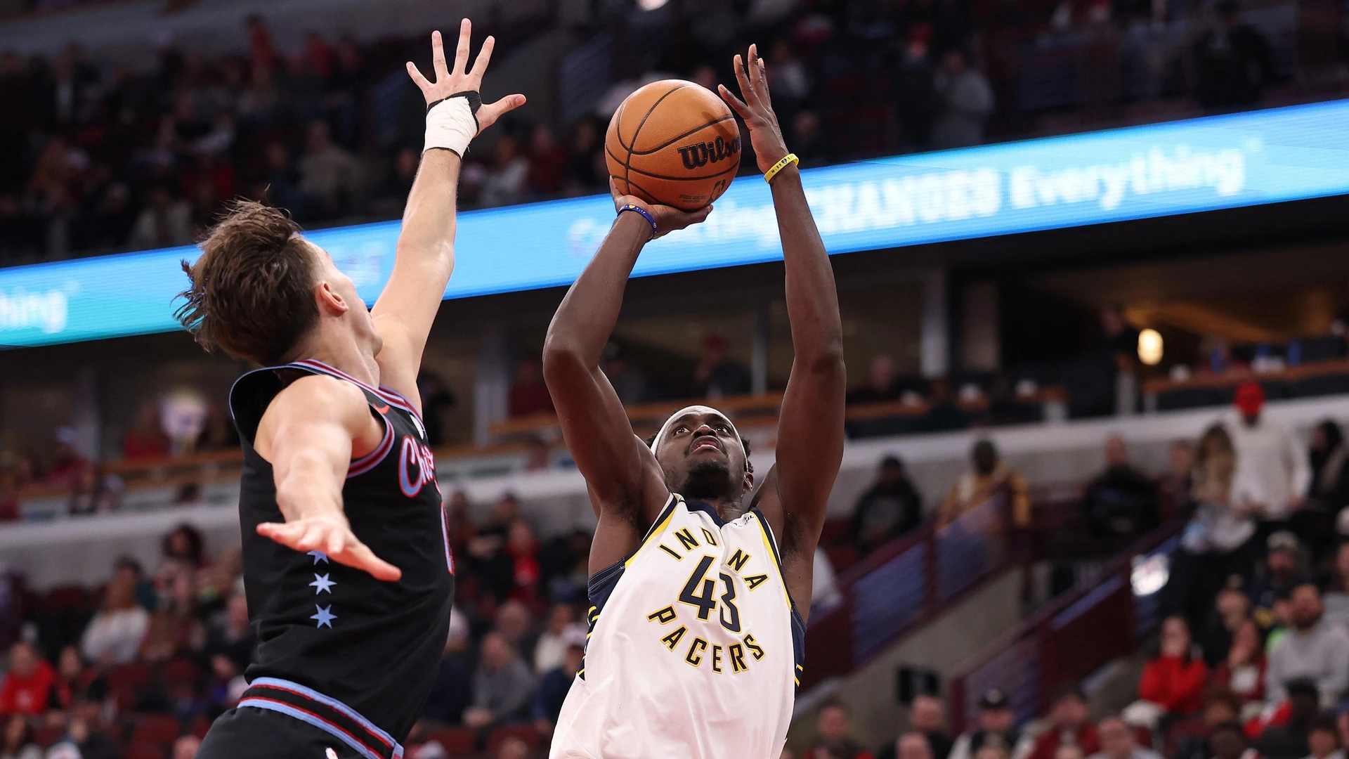 CHICAGO, ILLINOIS - DECEMBER 05: Pascal Siakam #43 of the Indiana Pacers shoots over Zach Collins #12 of the Chicago Bulls during the second half at the United Center on December 05, 2025 in Chicago, Illinois.