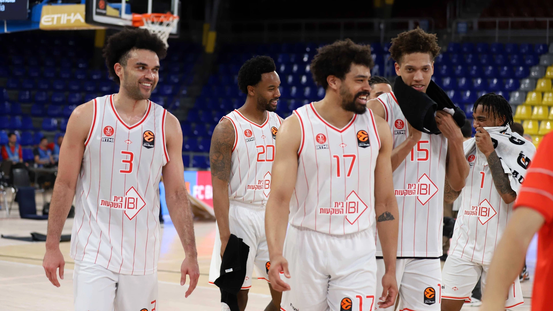 Hapoel Tel Aviv players celebrate the victory during the Basketball Euroleague match between FC Barcelona, Barca and Hapoel Ibi Tel Aviv at Palau Blaugrana on13 March 2026 in Barcelona